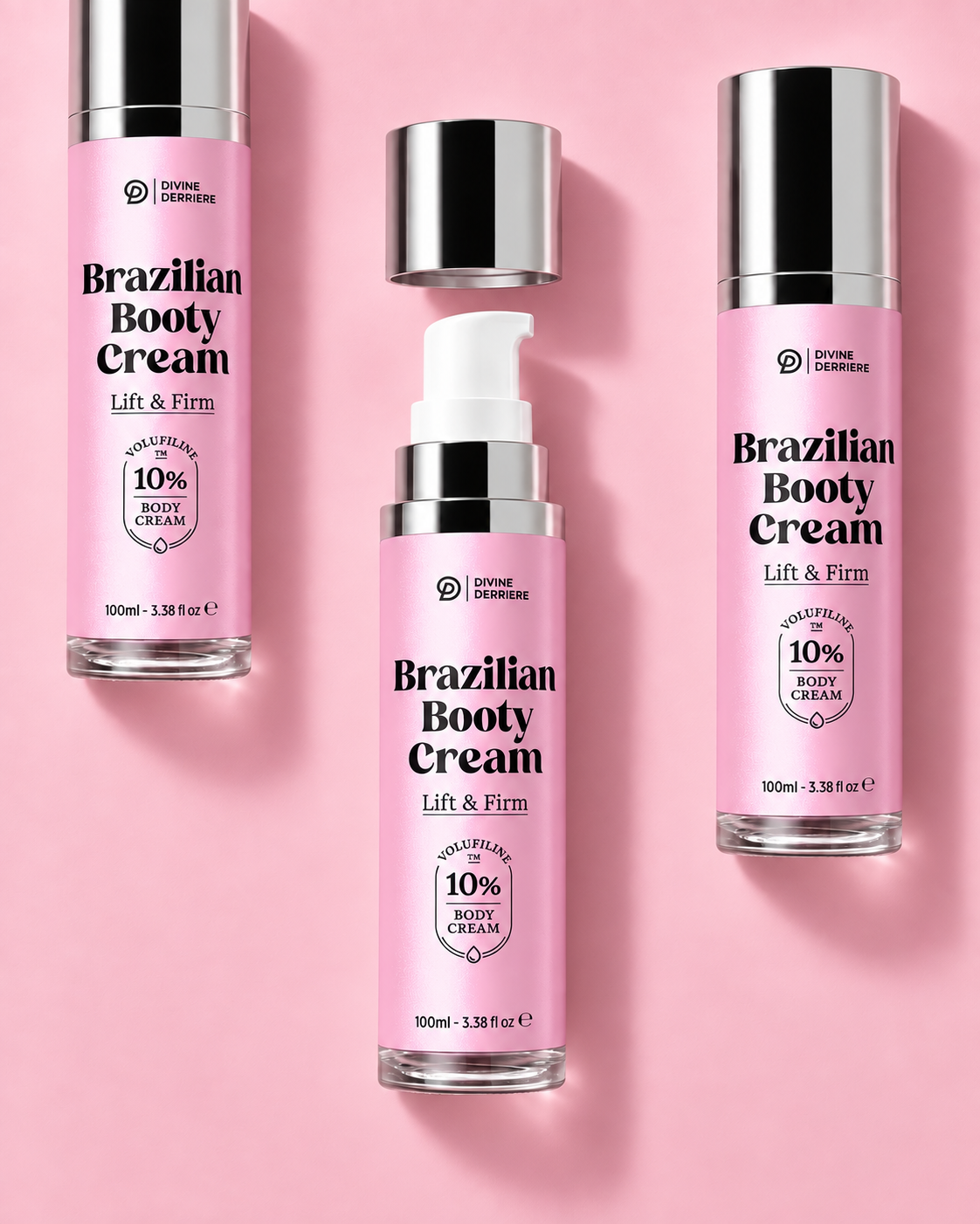 Brazilian Booty Cream 100ml bottles, one uncapped with a separate chrome cap, arranged on blush pink